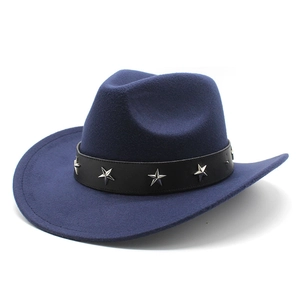 Detail of silver star studs on a black leather band around a navy wool cowboy hat