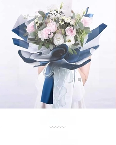 Close-up of blue and white pearl fishtail mesh ribbon for elegant flower bouquet wrapping
