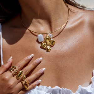 Minimalist 18K gold plated stainless steel floral necklace with pearl on model