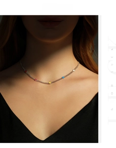 Detail of s925 silver choker with colorful heart charms on model neck for daily styling