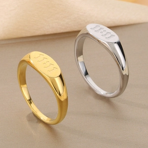Minimalist stainless steel oval rings with 11:11 engraving in gold and silver finishes