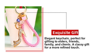 Detail of pink rhinestone high heel keychain with braided rope and crystal charms