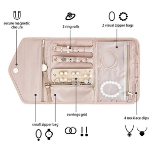 Schmucktasche aus Stoff in Rosa mit Magnetverschluss und mehreren Fächern für unterwegs