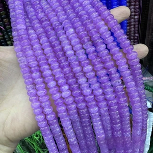Detailed view of faceted purple natural stone abacus beads for DIY jewelry making