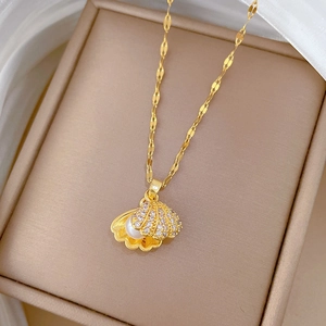 Close-up of shell pearl pendant necklace with zircon inlay in a jewelry box