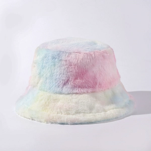 Close-up of the plush faux fur texture on a rainbow tie-dye bucket hat for winter