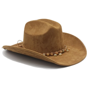 Detail of beaded band and leather tassels on a brown suede cowboy hat