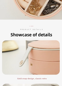 Close-up of pink jewelry box with golden snap closure and velvet ring compartments