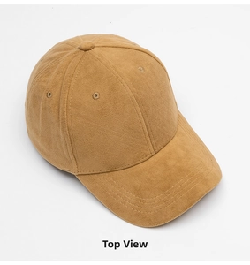 Top view of a camel faux suede baseball cap showing premium textured fabric and stitching