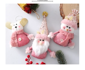 Detail view of 11.5cm pink plush Christmas ornaments with snowman and Santa figures