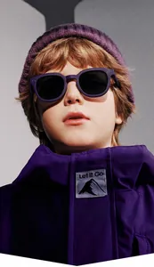 Close-up of matte purple round frame kids sunglasses with dark polarized lenses