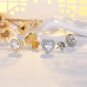 Elegant S925 sterling silver heart earrings with micro-set zircon stones in gold and silver