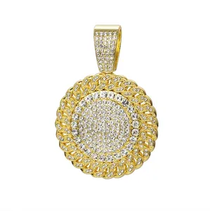 Iced-out round gold pendant with micro-pave zircons and textured edge on white background
