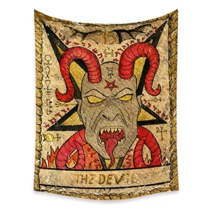 Detailed macro view of the Devil tarot card tapestry with dark red art mystery symbols