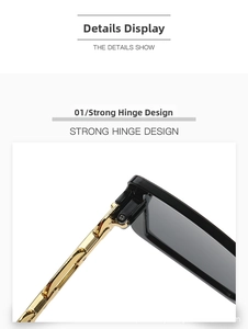 Detailed macro view of high-quality gold chain-style metal hinges on square sunglasses