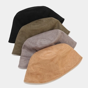 Unisex faux suede bucket hats available in black, army green, grey, and camel colors