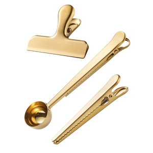 Golden stainless steel sealing clips set featuring coffee scoop and matte metal finish