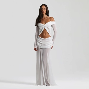 Detail of elegant white long sleeve dress with waist cut-outs and pleated hollow design