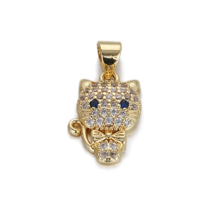 Detailed view of a gold owl pendant featuring white crystals and blue gemstone eyes