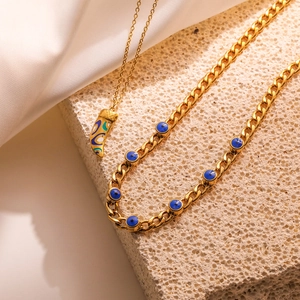 18K gold plated titanium necklaces with blue evil eye motifs and colorful enamel pendant