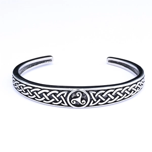 Vintage silver Viking cuff bracelet featuring Triskele and Celtic knot patterns for men