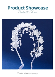 Detailed close-up of white acrylic flower headband with pearls and silver wire weaving