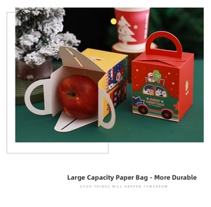 Detail of Christmas gift boxes showing large capacity for apples and festive Santa design
