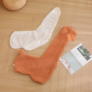 Brown alpaca plush toy shell cover with white inner liner shown on wooden floor