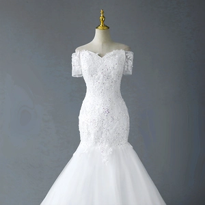 Elegant off-shoulder lace mermaid wedding dress with floral embroidery and sequins