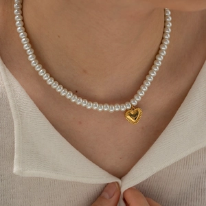 Elegant 18k gold plated pearl necklace featuring a polished heart pendant for women