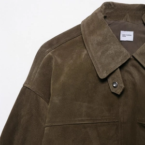 Women's dark brown faux suede jacket featuring lapel collar and pocket detail in autumn style