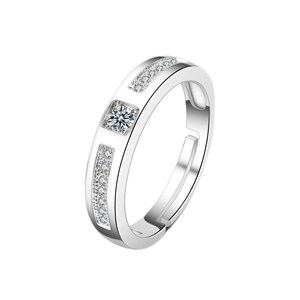 Macro detail of silver adjustable ring featuring princess cut zircon and pave stones
