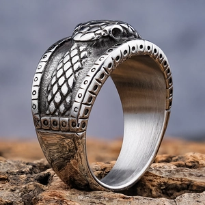 Retro stainless steel snake ring with detailed scales and an antique silver finish