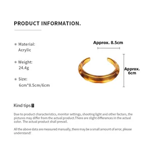 Detail specifications of amber acrylic irregular open bracelet weighing 24.4g and 8.5x6cm