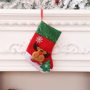 Festive Christmas stocking with 3D reindeer, snowflakes and trees hanging on a white mantel