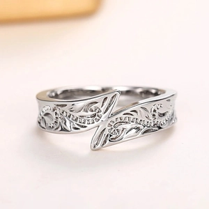 Vintage bohemian silver metal ring with engraved vine patterns and open adjustable design