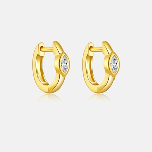 Detail of S925 sterling silver gold hoop earrings with marquise-cut white gemstone settings