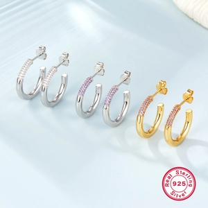 Elegant S925 sterling silver hoop earrings with cubic zirconia in silver and gold finishes