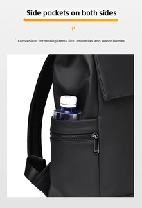 Detail of waterproof business backpack side pocket holding a water bottle