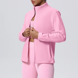 Detail of pink fleece sports jacket with high collar and zipper for fitness