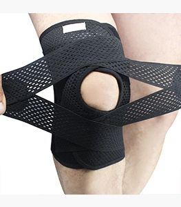 Détail de la genouillère de compression avec maille respirante et sangles de maintien