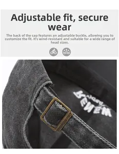 Detail of vintage grey baseball cap featuring adjustable bronze buckle and durable fabric