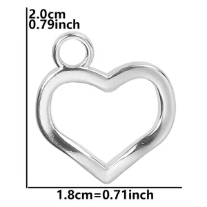 Macro detail of silver heart pendant with dimensions of 2.0cm height and 1.8cm width