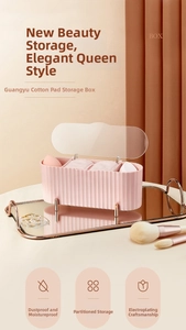 Detail view of pink striped storage box with three compartments and gold electroplated legs