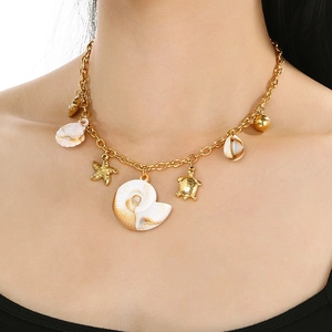 Ocean theme stainless steel necklace with shell, turtle, and starfish gold pendants