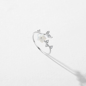 Elegant S925 silver camellia open ring featuring white shell petals and sparkling zircon