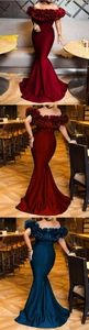 Macro detail of wine red off-shoulder ruffle neckline and premium satin fabric texture