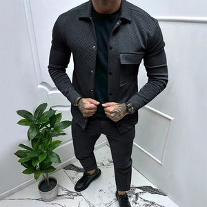 Detailed view of the ribbed texture and grey fabric on the men's casual two-piece suit