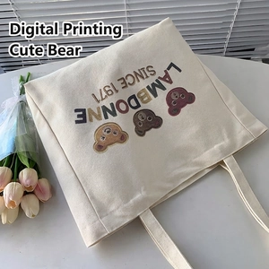 Off-white canvas tote bag featuring cute cartoon bear prints and dual shoulder straps