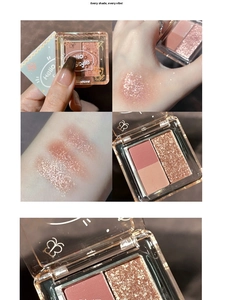 Detail view of mini eyeshadow palette with matte pink and gold glitter arm swatches